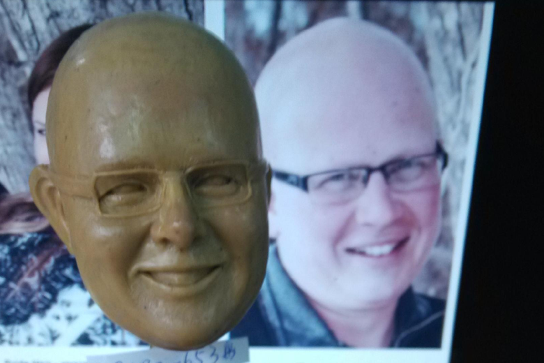 Groom head shot for use in sculpting the wedding cake topper